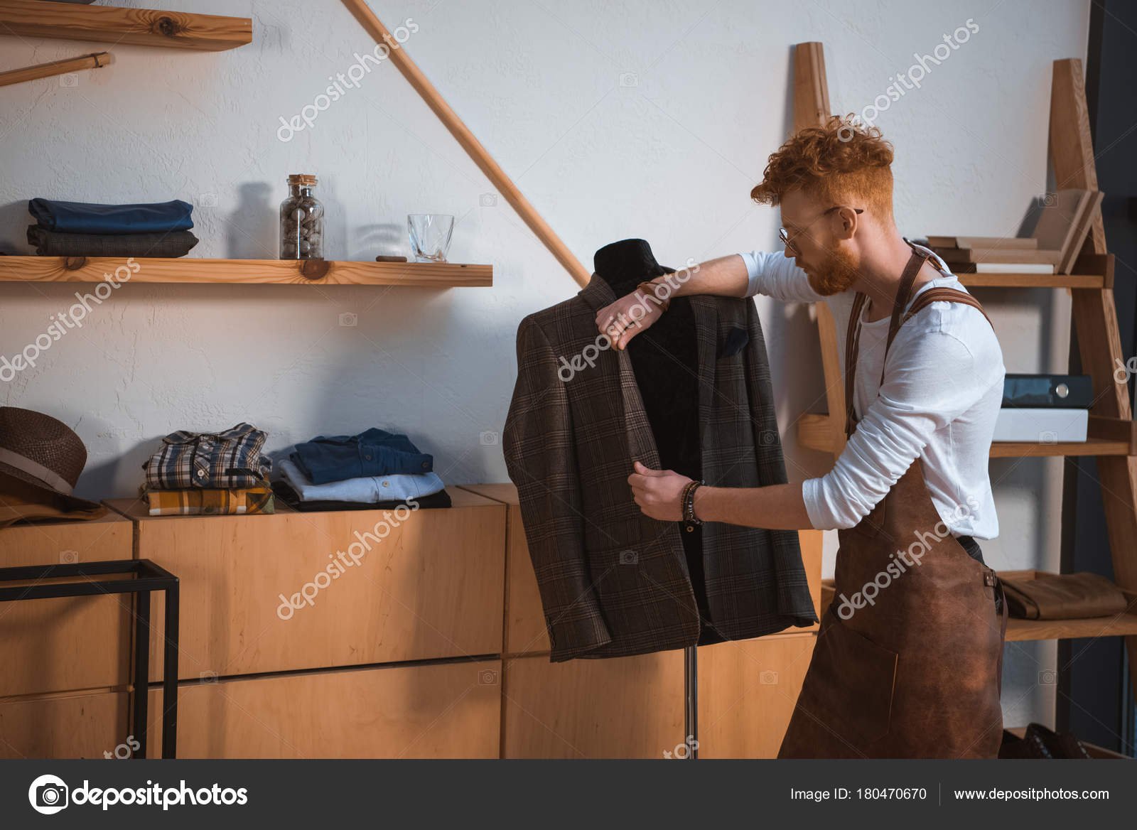 depositphotos_180470670-stock-photo-young-male-fashion-designer-apron