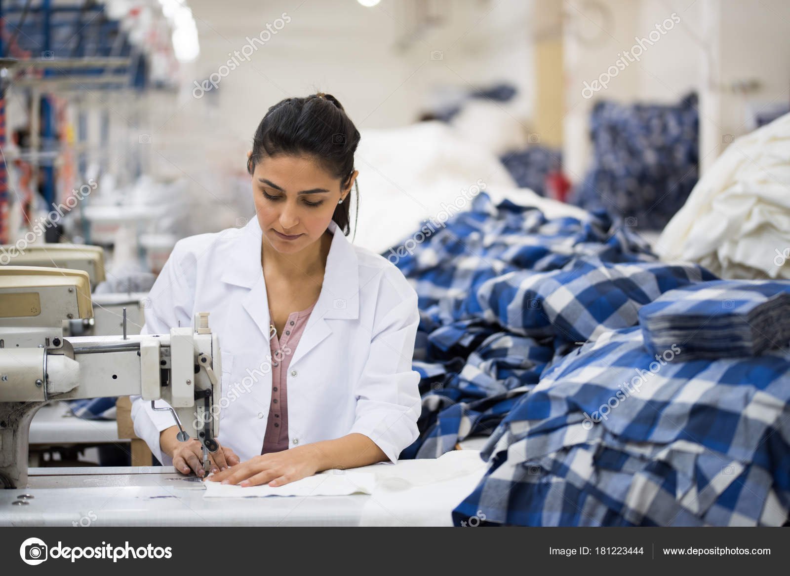 depositphotos_181223444-stock-photo-positive-young-woman-sewing-with