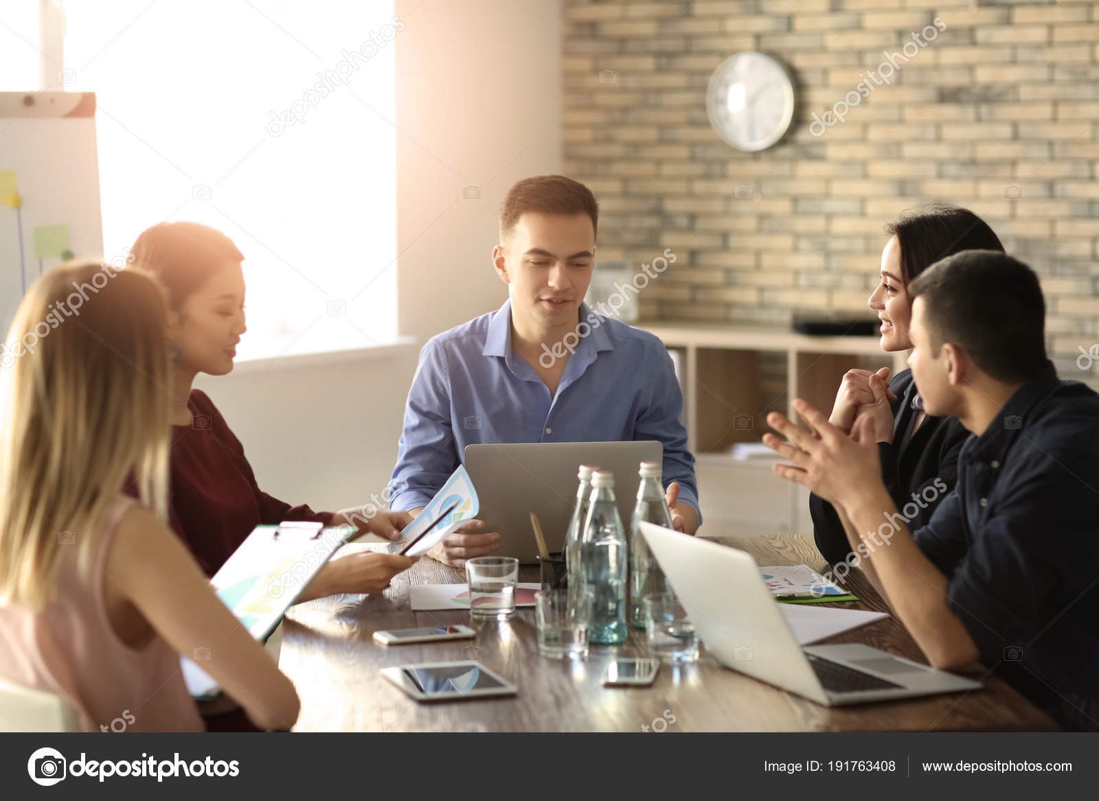 depositphotos_191763408-stock-photo-young-people-having-business-meeting