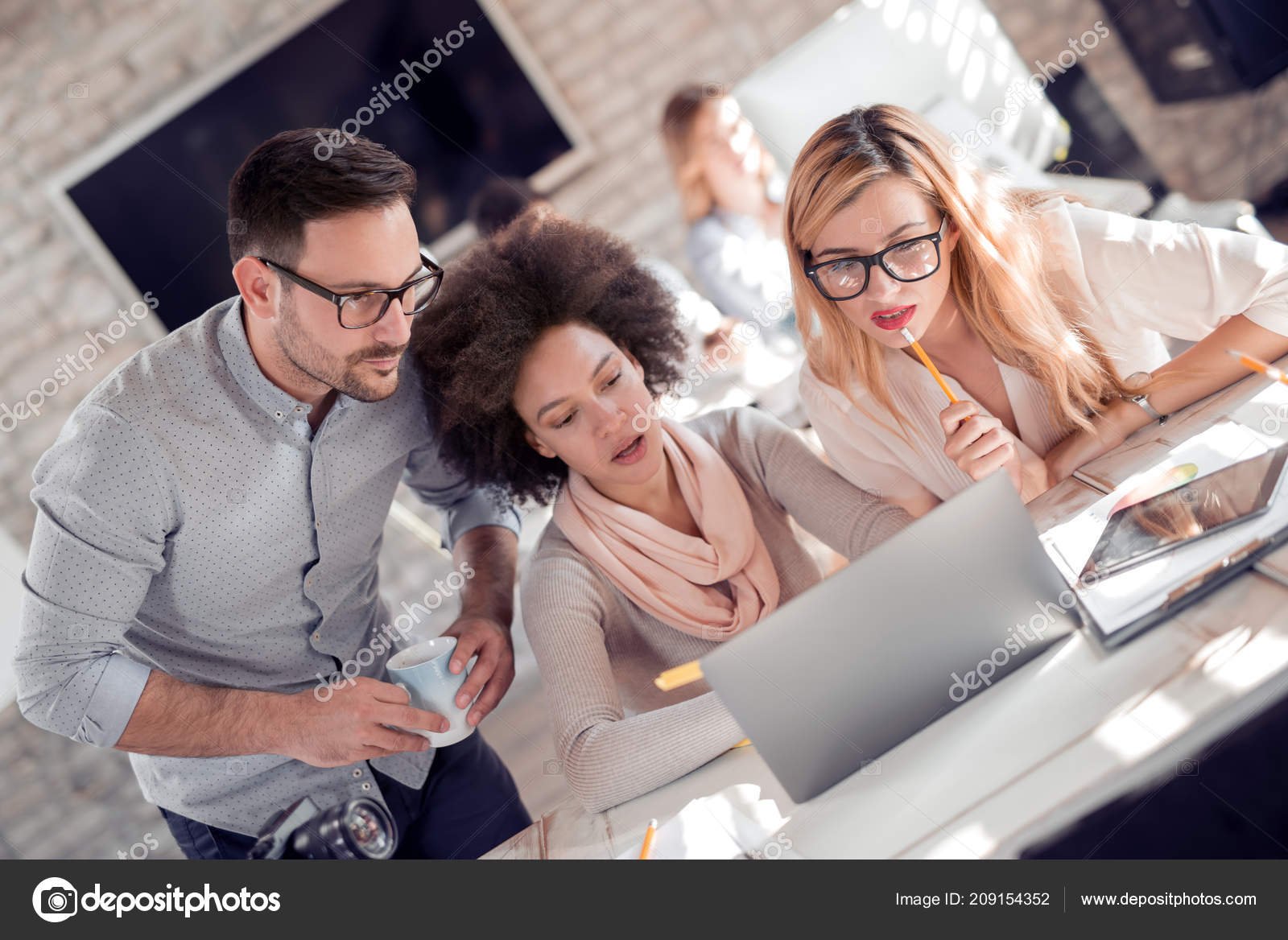 depositphotos_209154352-stock-photo-three-confident-business-persons-discussing