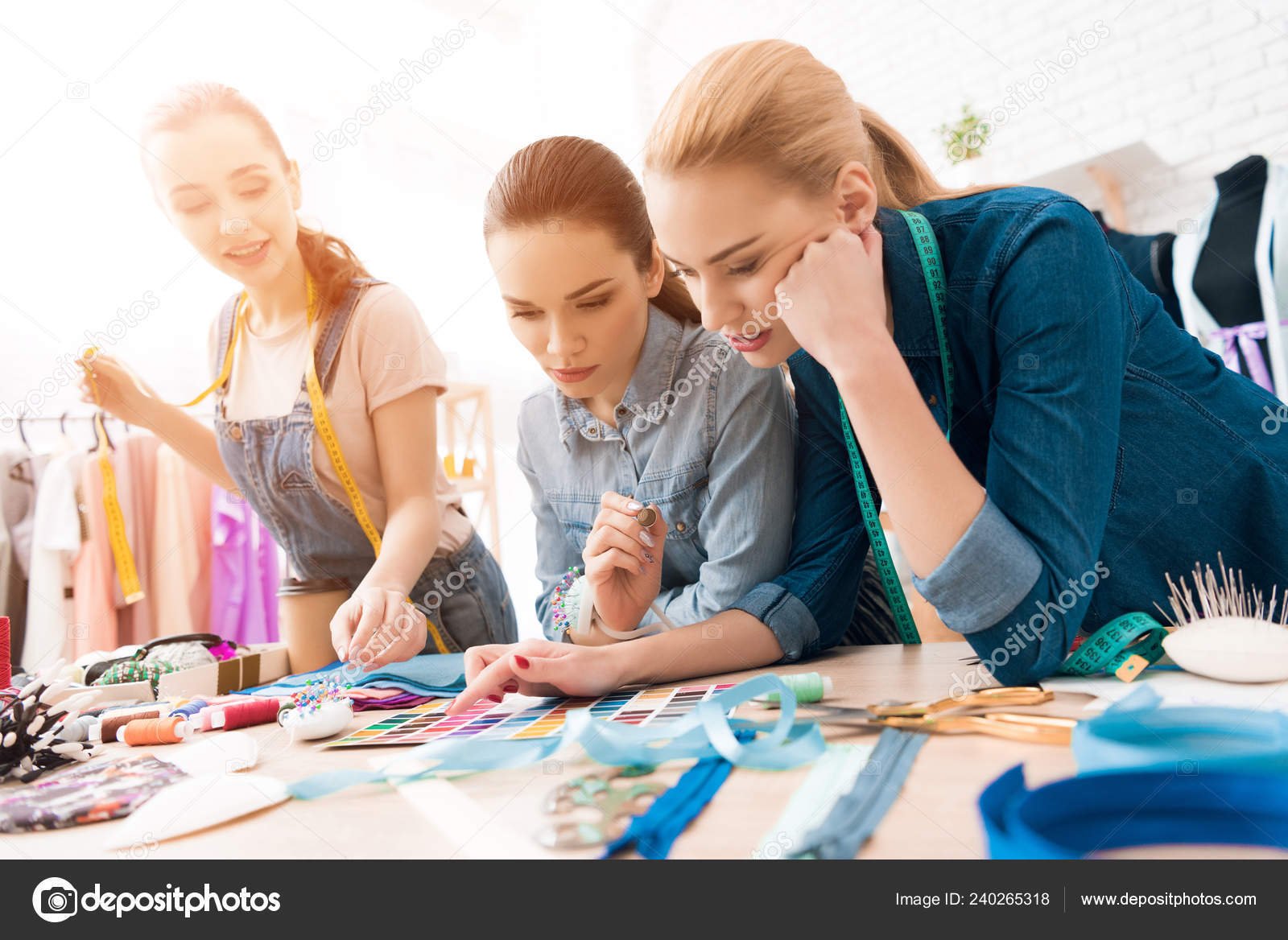 depositphotos_240265318-stock-photo-three-girls-at-garment-factory