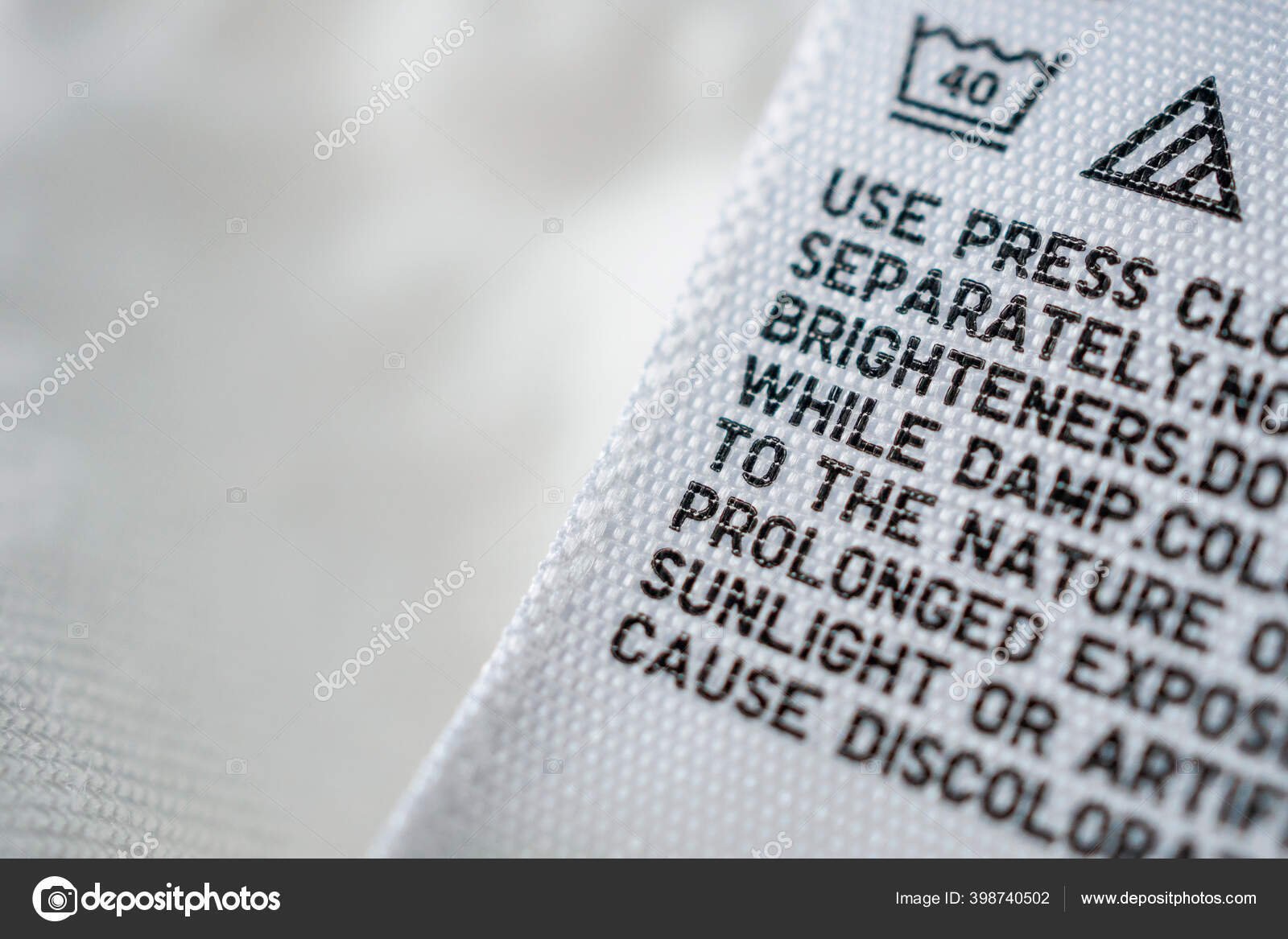 depositphotos_398740502-stock-photo-cloth-label-tag-laundry-care