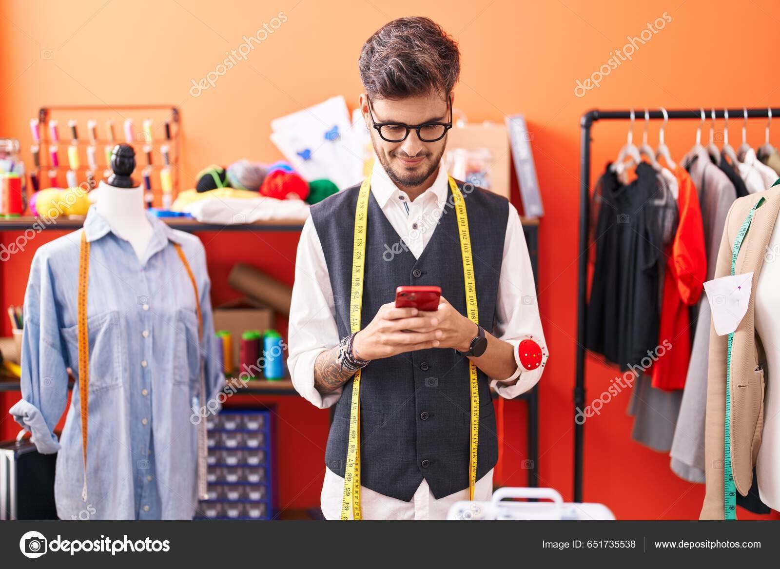 depositphotos_651735538-stock-photo-young-hispanic-man-tailor-smiling