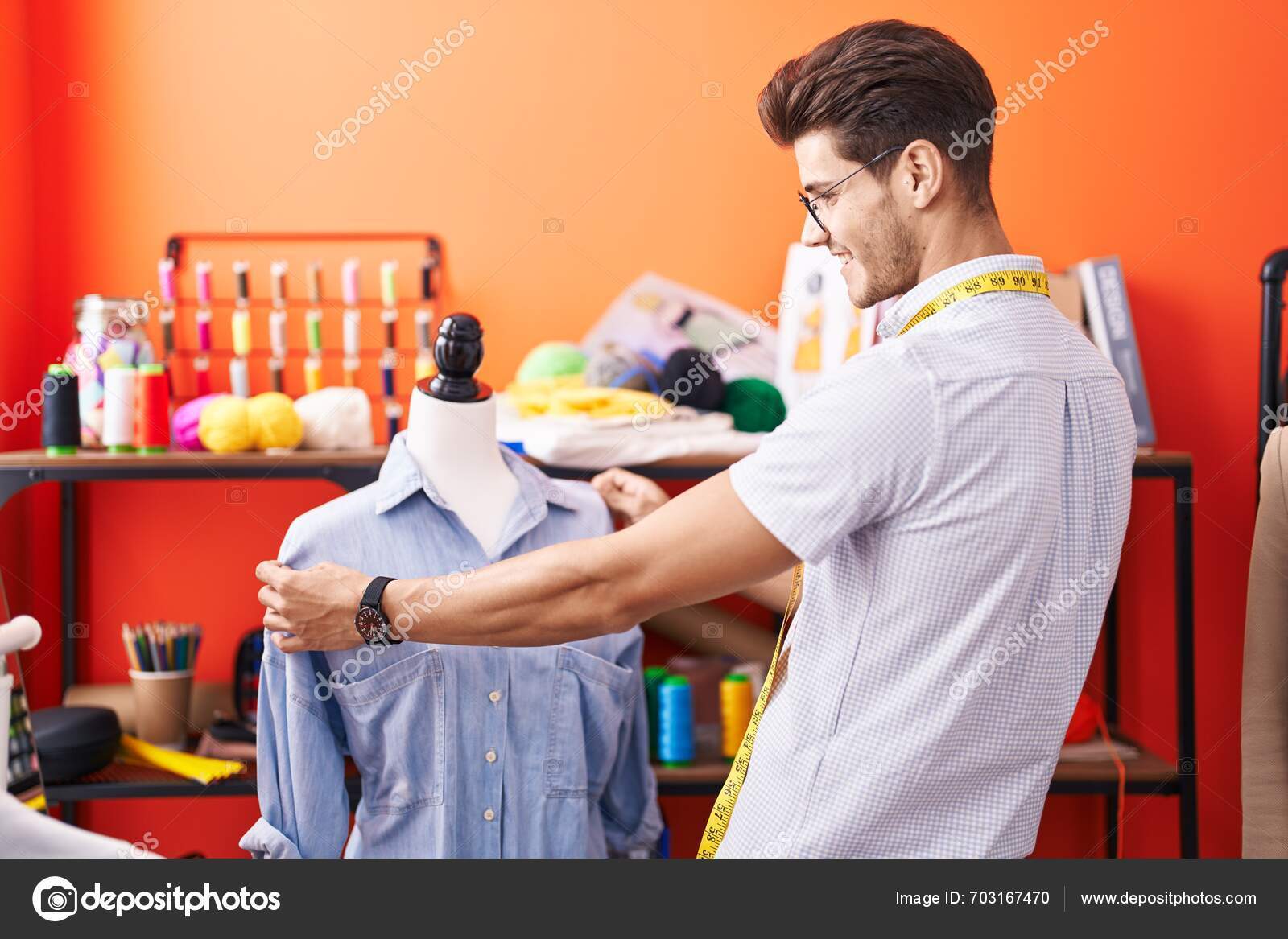 depositphotos_703167470-stock-photo-young-hispanic-man-tailor-smiling