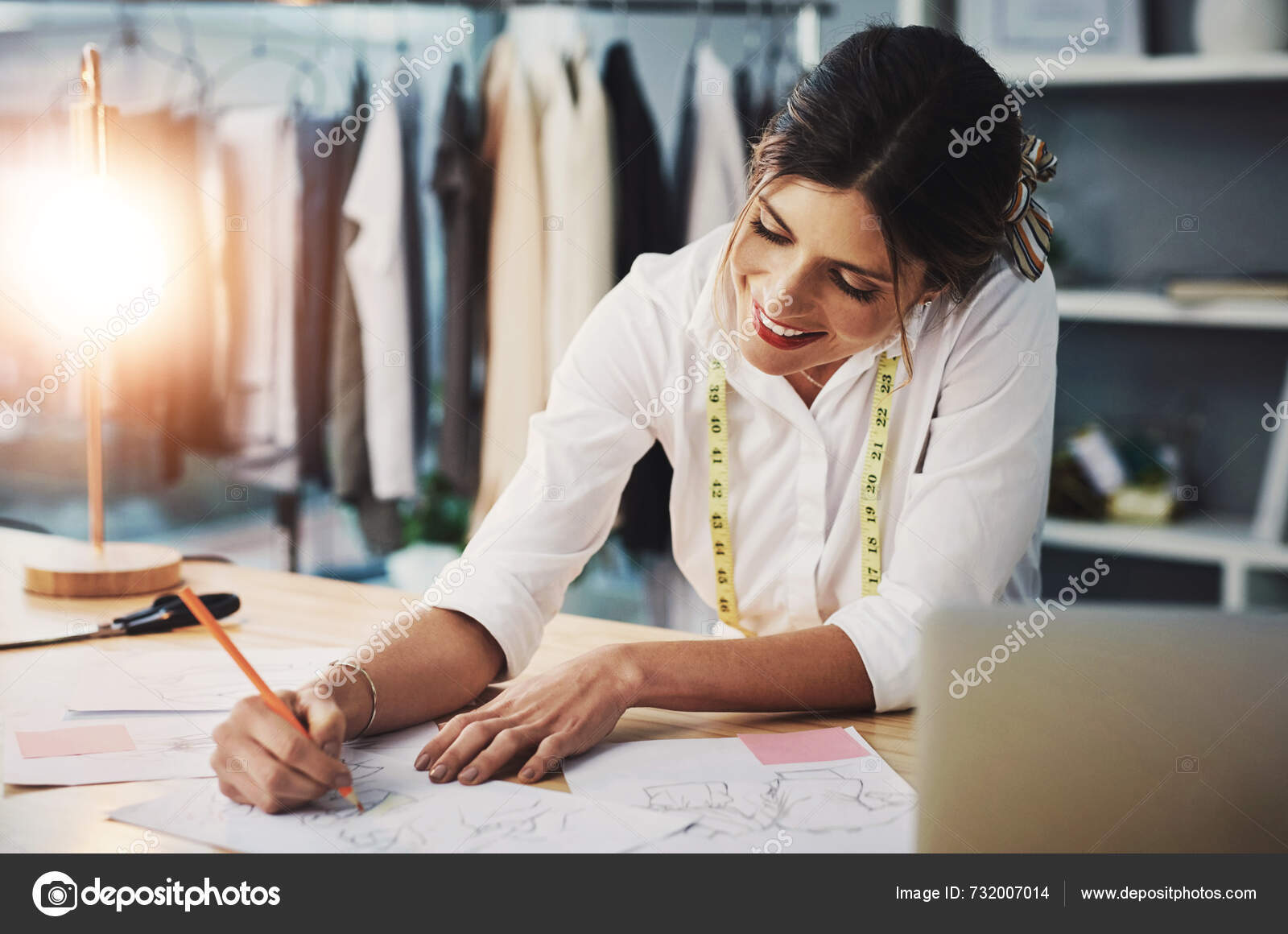 depositphotos_732007014-stock-photo-fashion-designer-drawing-woman-workshop