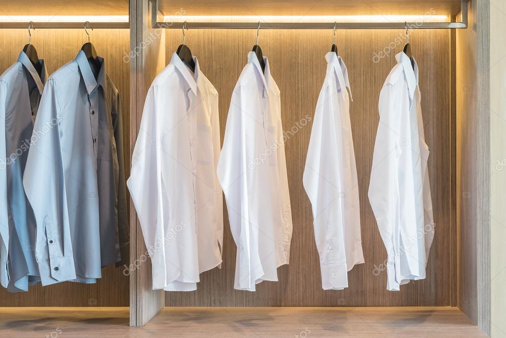 depositphotos_93540580-stock-photo-white-and-grey-shirts-hanging