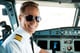 depositphotos_55977019-stock-photo-male-pilot-sitting-in-cockpit