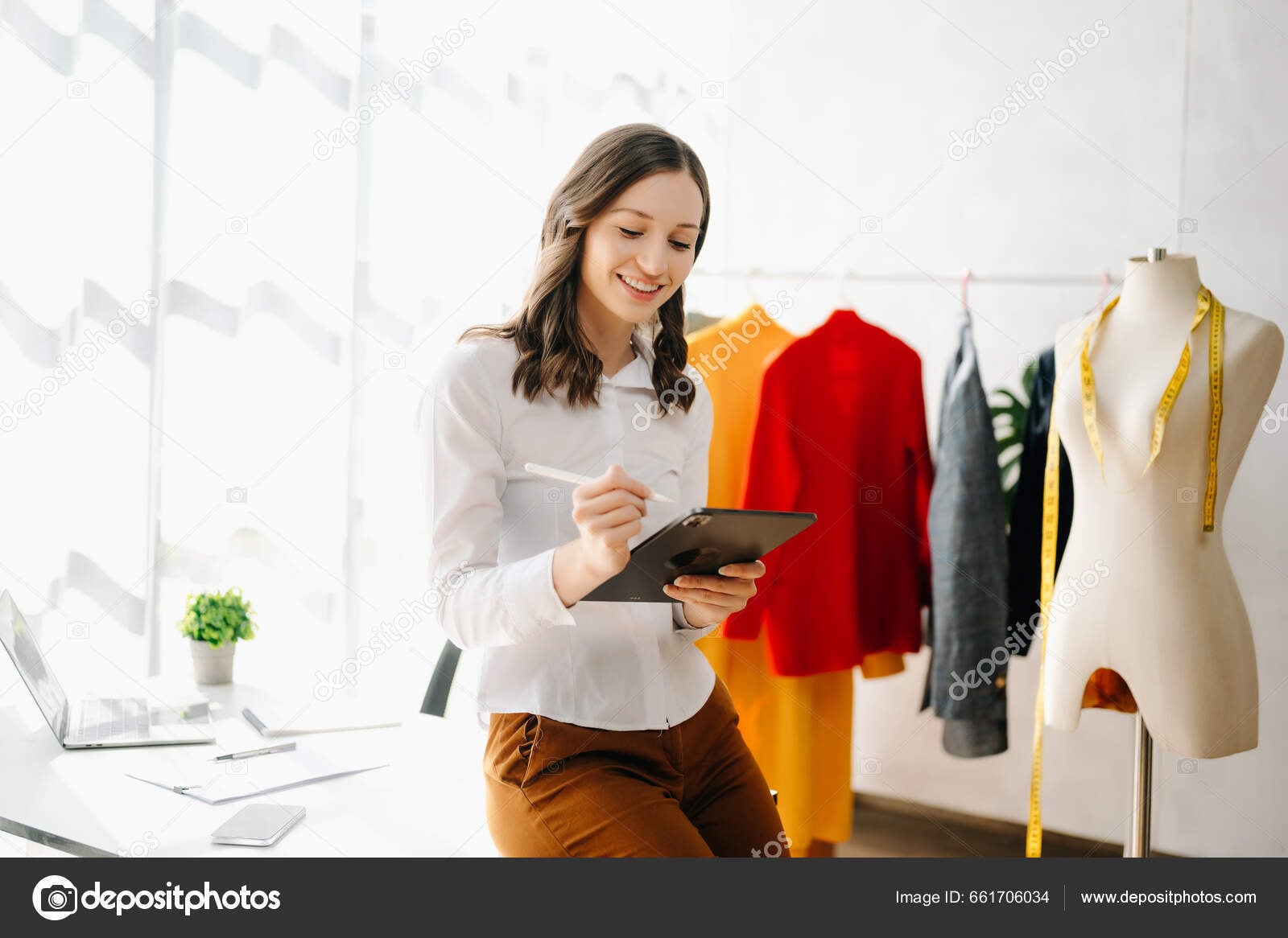 depositphotos_661706034-stock-photo-fashion-designer-woman-smartphone-using