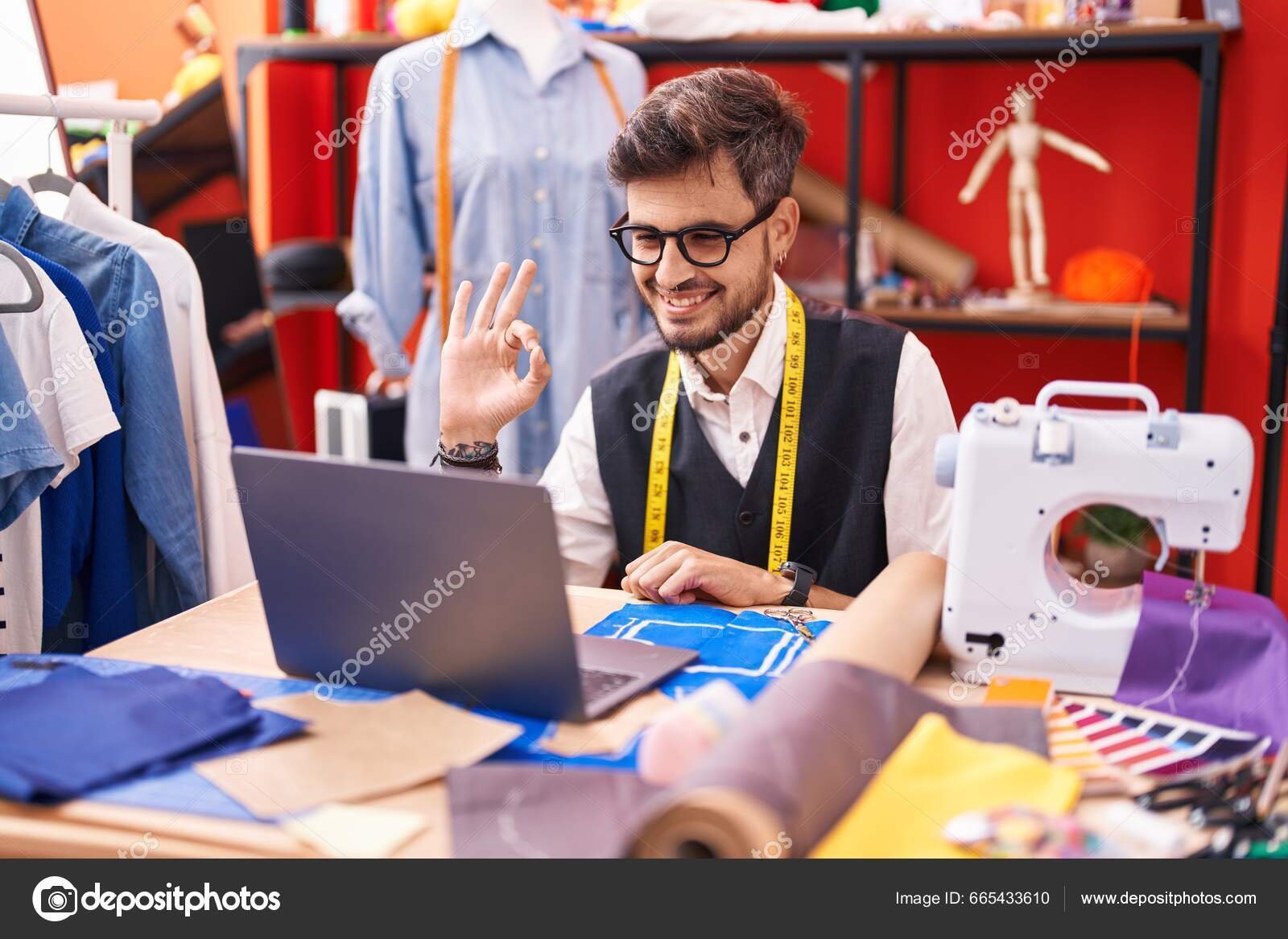 depositphotos_665433610-stock-photo-young-hispanic-man-tattoos-dressmaker