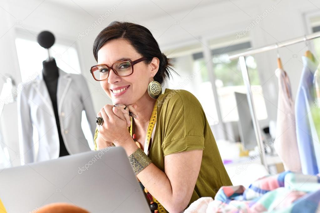depositphotos_108375060-stock-photo-woman-designer-working