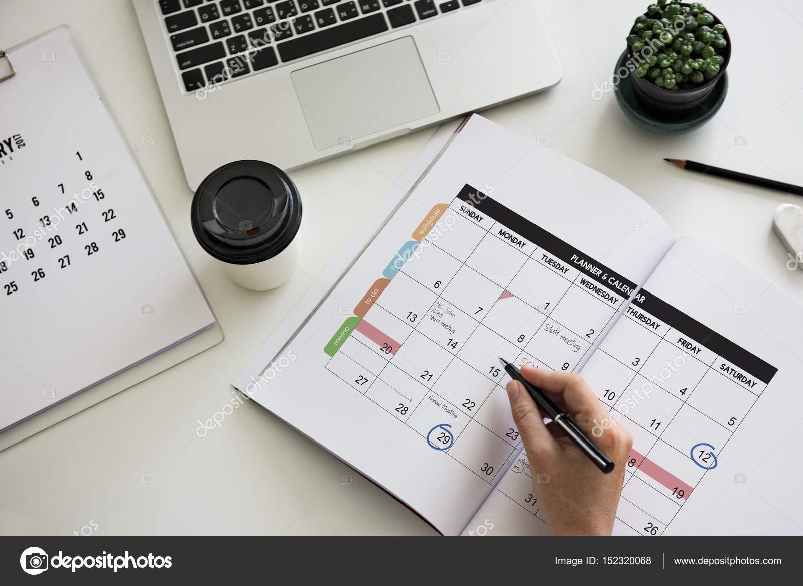 depositphotos_152320068-stock-photo-businessperson-writing-notes