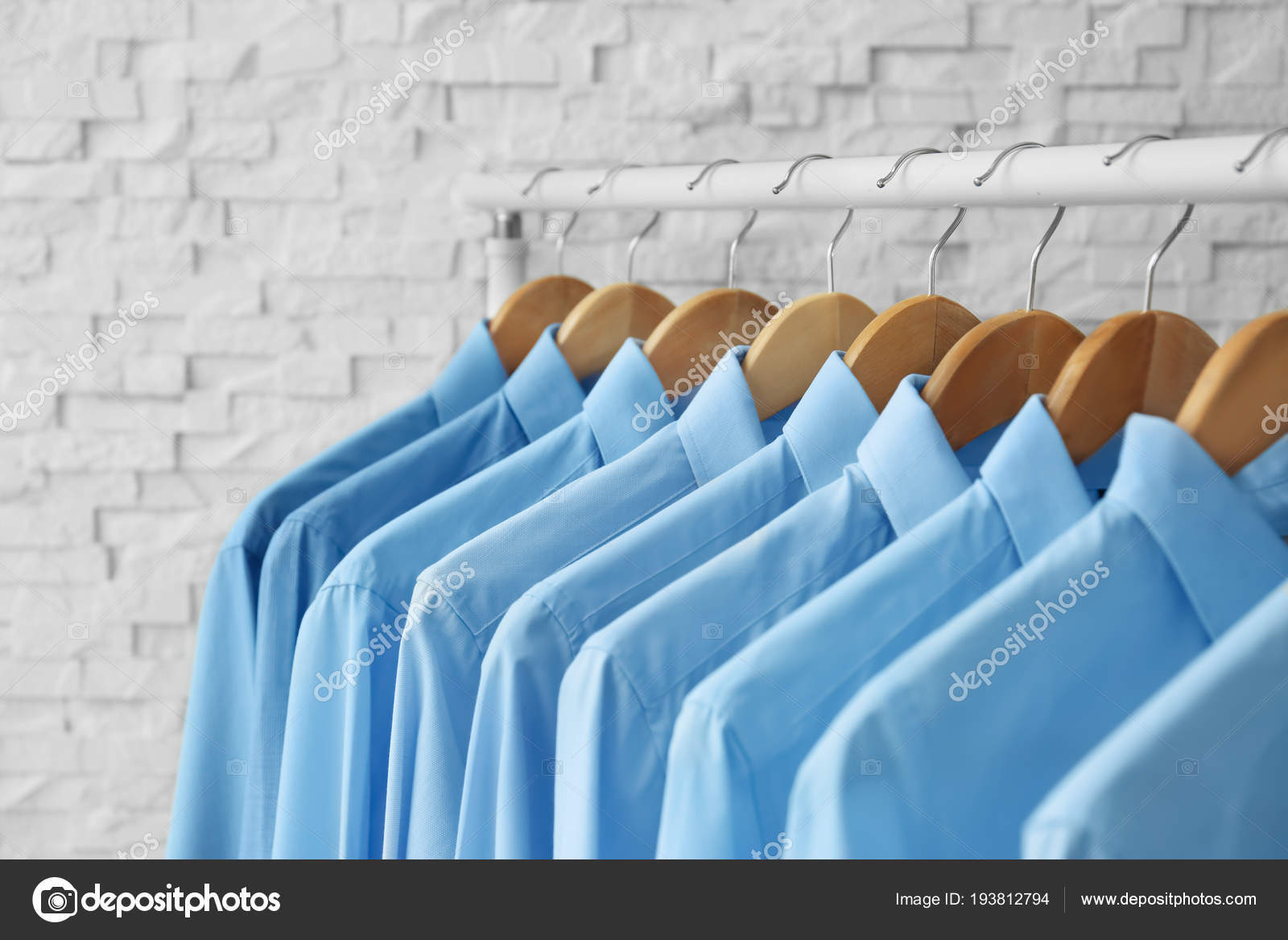 depositphotos_193812794-stock-photo-rack-with-clean-clothes-on