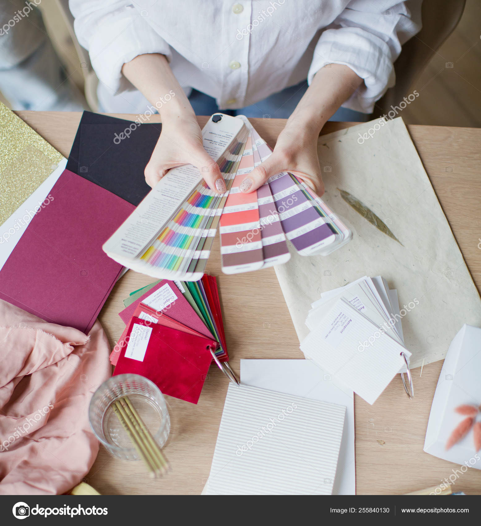 depositphotos_255840130-stock-photo-woman-at-workplace-choosing-colourful