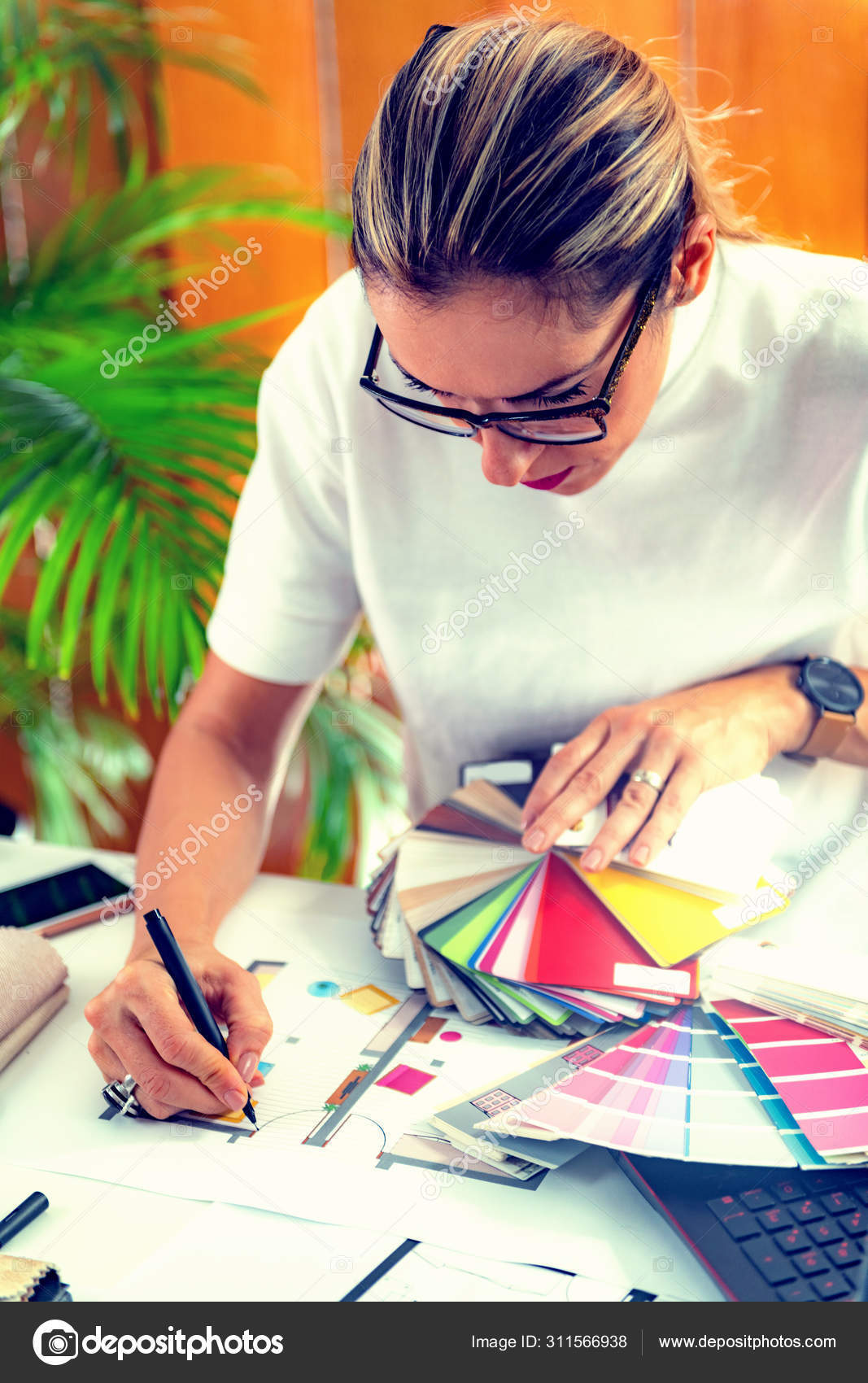depositphotos_311566938-stock-photo-architect-interior-designer-working-material