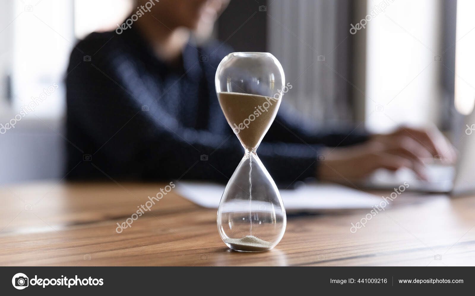 depositphotos_441009216-stock-photo-close-up-view-of-hourglass