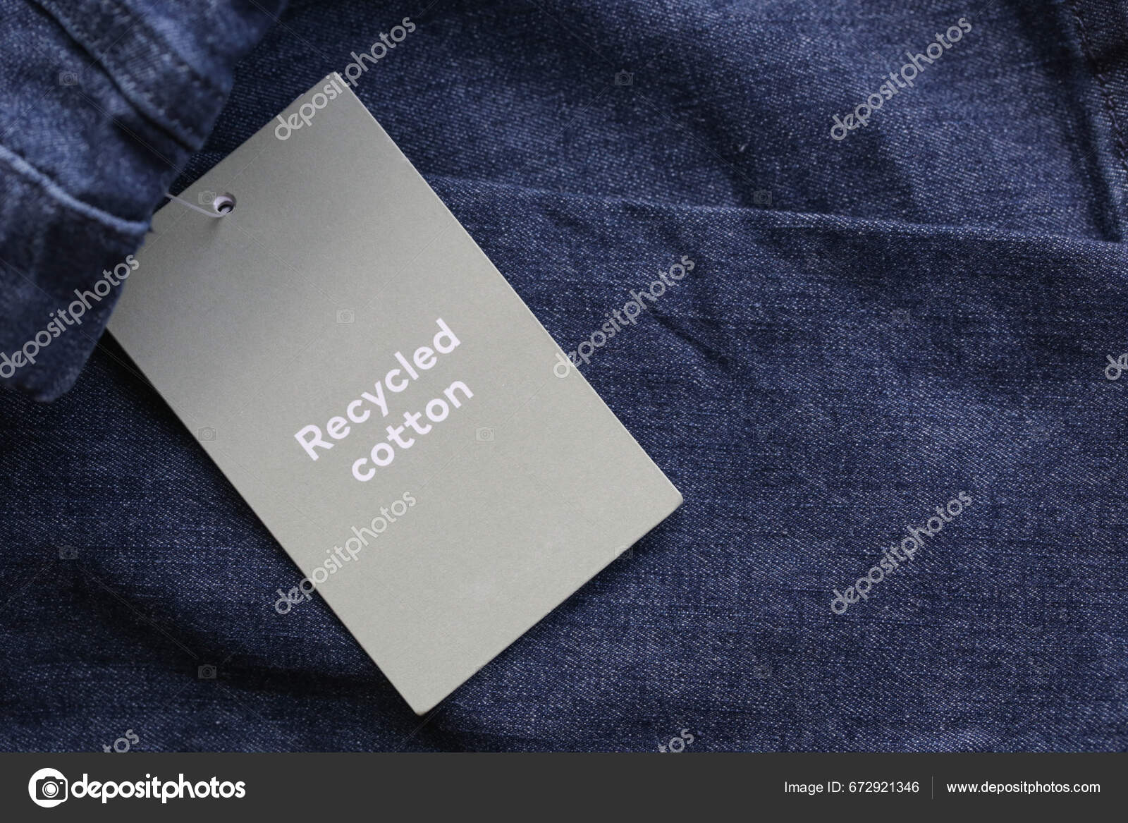 depositphotos_672921346-stock-photo-close-clothing-hang-tag-recycled