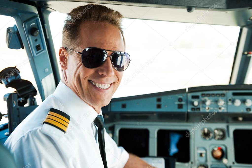 depositphotos_55977019-stock-photo-male-pilot-sitting-in-cockpit